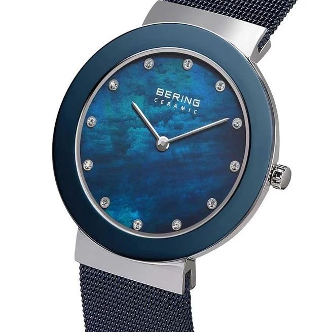 Bering Round Analog Blue Dial Women Watch - 11435-387