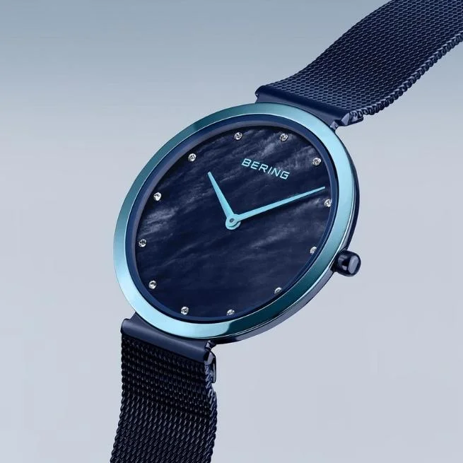 Bering Round Analog Blue Dial Women Watch- 18132-398