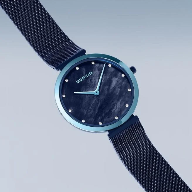 Bering Round Analog Blue Dial Women Watch- 18132-398